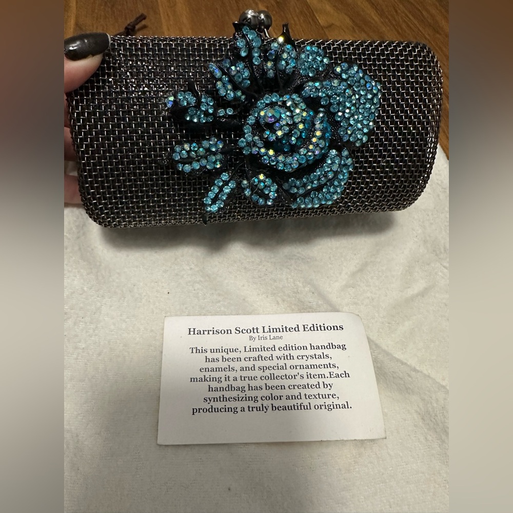 Iris Lane: Harrison Scott Black Clutch with Blue Crystal Flower